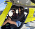 Two friends in the cockpit before a 90-minute discovery flight for two over Downtown Los Angeles