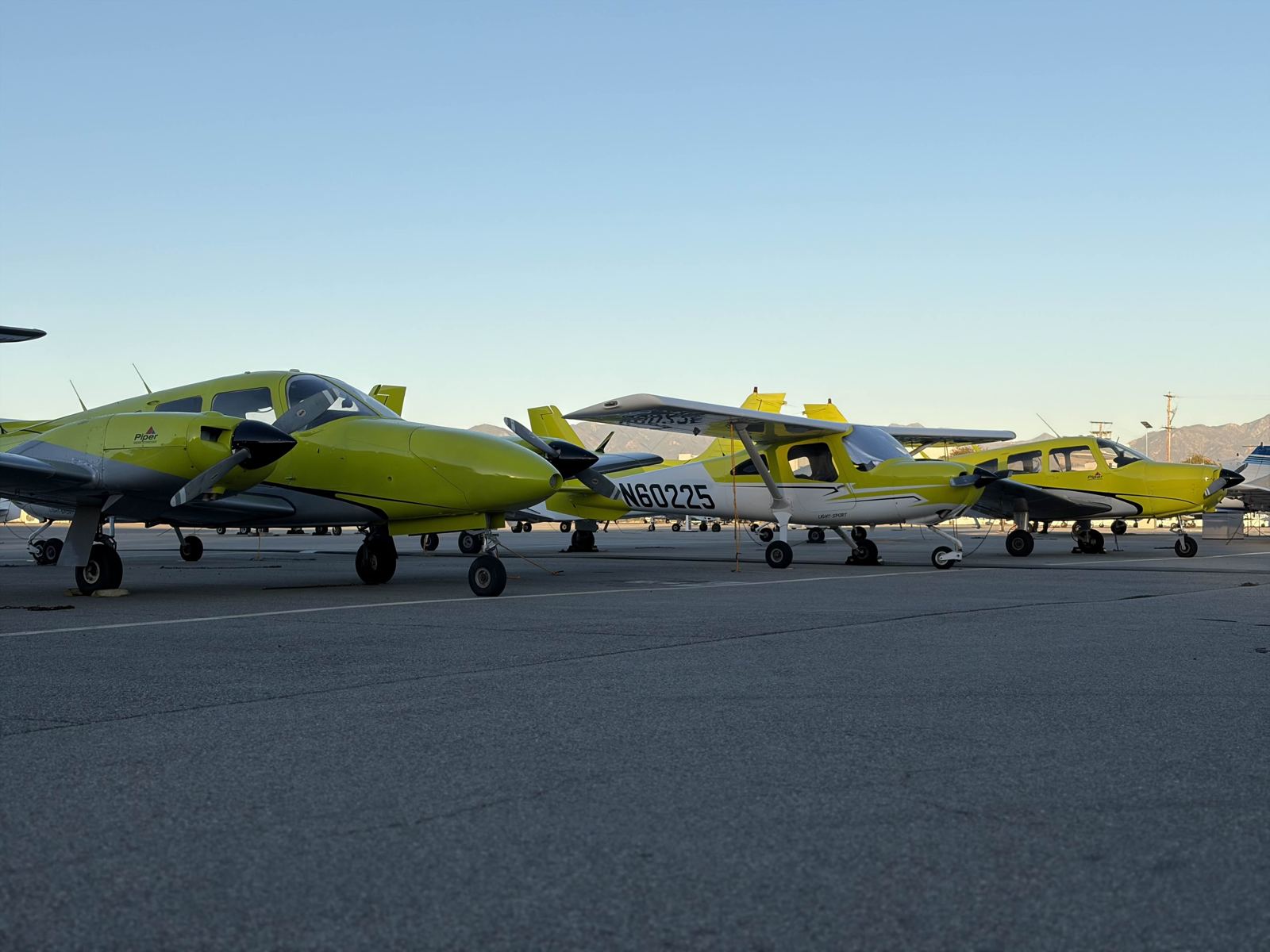 The fleet lined up on the ramp at Van Nuys at dusk