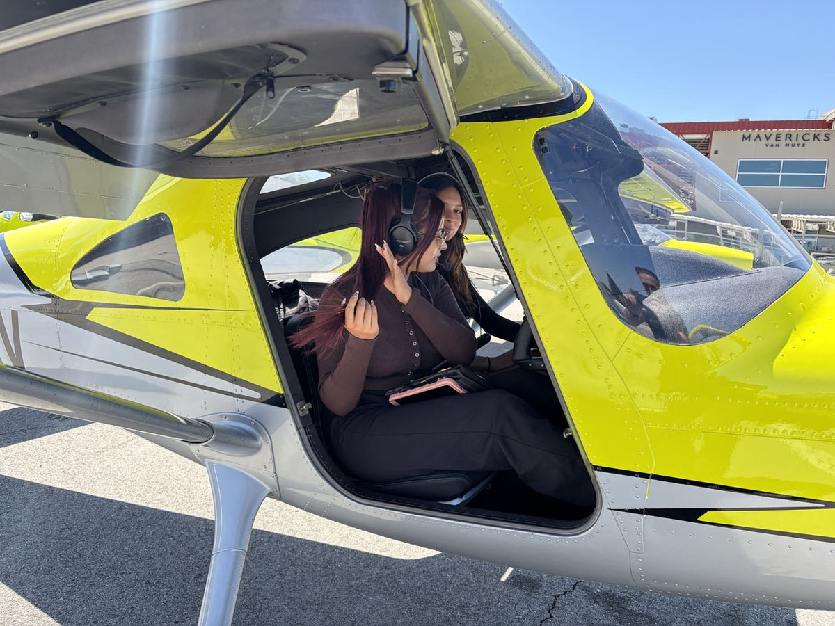 First-time flyer at the controls on a pilot-for-a-day discovery flight over Los Angeles