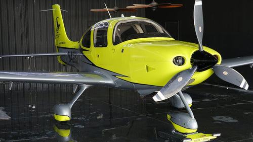 Front view of the Cirrus SR22 in the hangar at Van Nuys