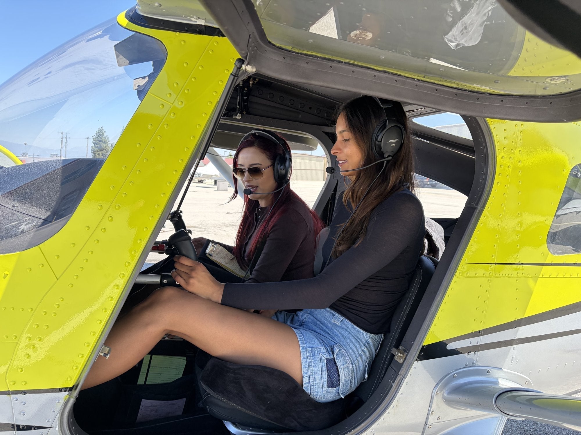 Two friends in the cockpit before a 90-minute discovery flight for two over Downtown Los Angeles