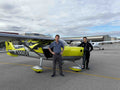 Couple with their instructor at Van Nuys Airport before a two-hour discovery flight for two over Los Angeles