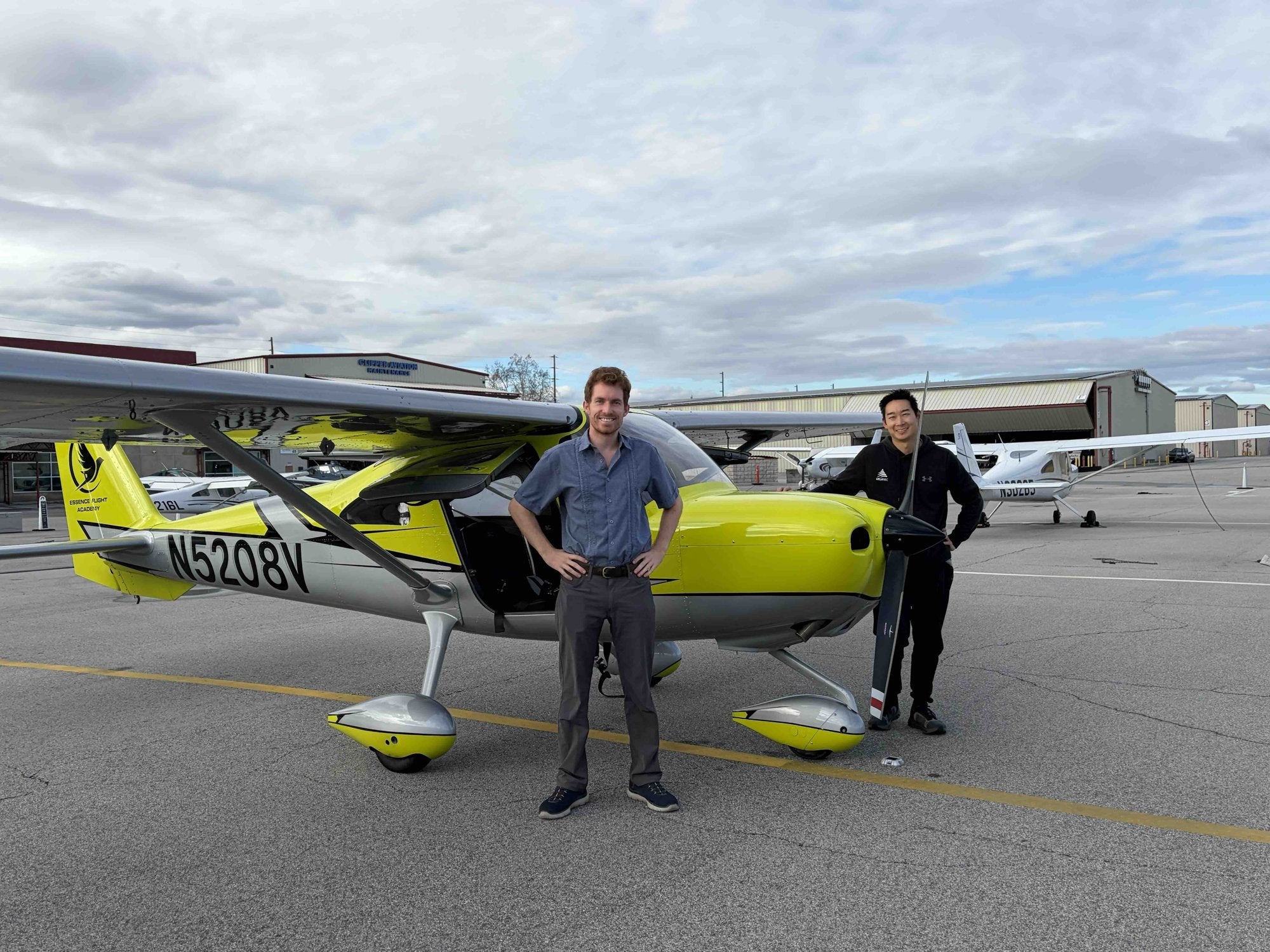 Couple with their instructor beside the airplane at Van Nuys Airport before a 90-minute discovery flight for two