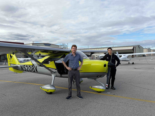 Couple with their instructor beside the airplane at Van Nuys Airport before a discovery flight for two