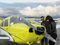 Instructor and student beside a Piper Warrior before a discovery flight at Van Nuys Airport, Los Angeles
