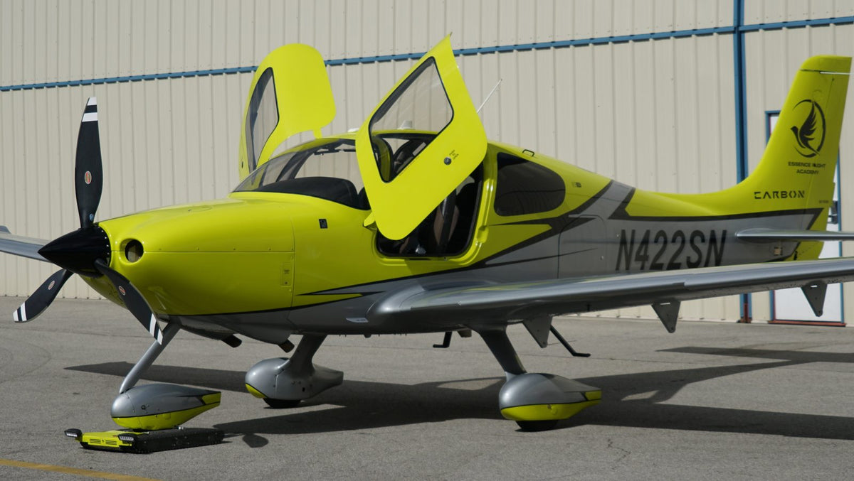 Cirrus SR22 Turbo N422SN with its gull-wing door open on the ramp at Van Nuys