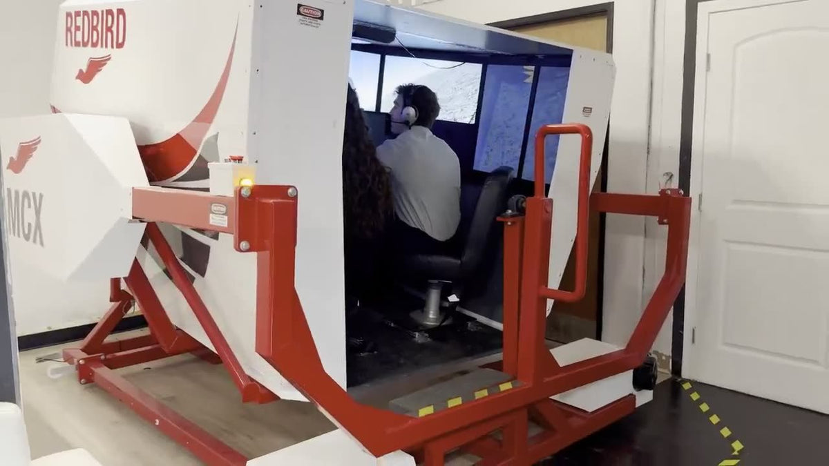 A student flying the Redbird MCX full-motion simulator at You Fly LA, Van Nuys Airport