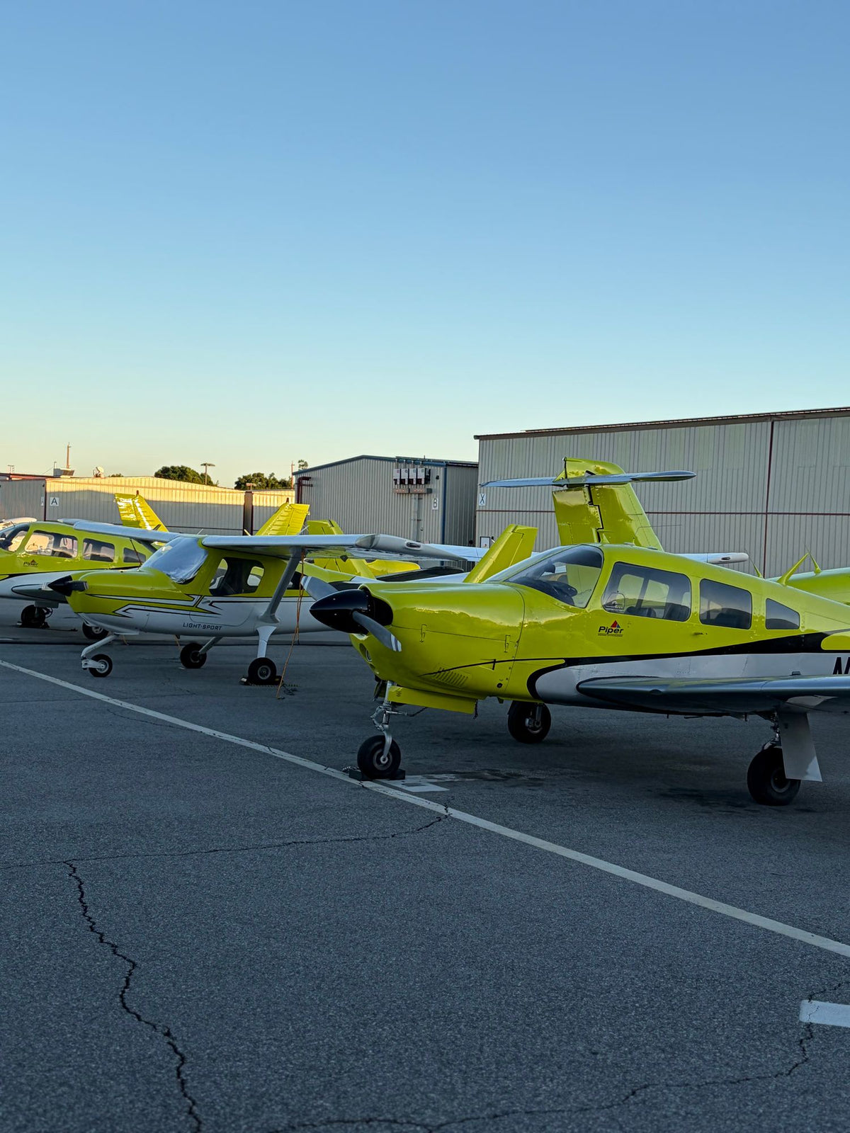 Piper Arrow in front of the fleet row at dusk